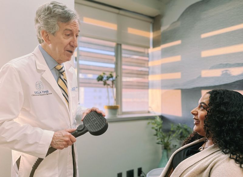 Dr. Andrew Leuchter with a patient at UCLA