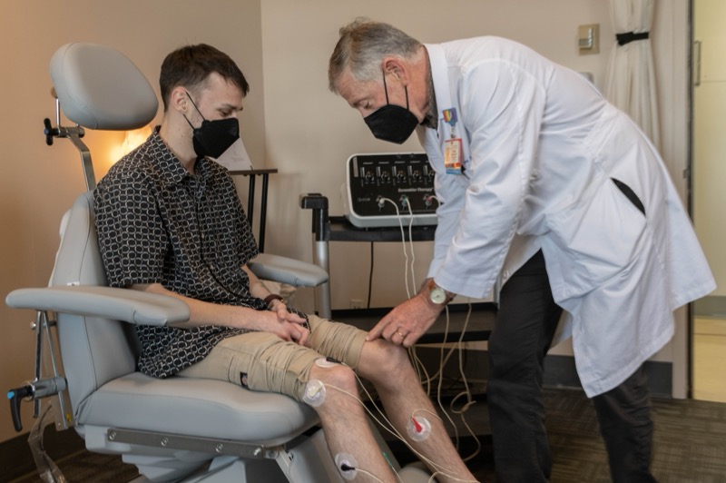 Dr. Tom Strouse demonstrating Scrambler Therapy at UCLA
